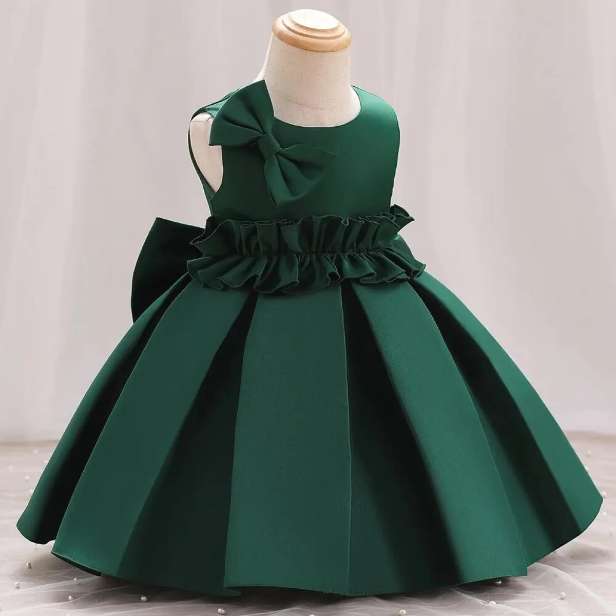 2023 Abito da ragazza di fiori da sposa per bambini Abito in raso con grande fiocco Il primo abito da banchetto di Natale adatto