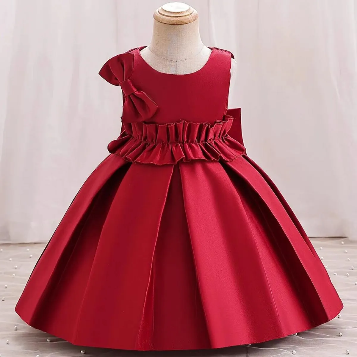 2023 Abito da ragazza di fiori da sposa per bambini Abito in raso con grande fiocco Il primo abito da banchetto di Natale adatto