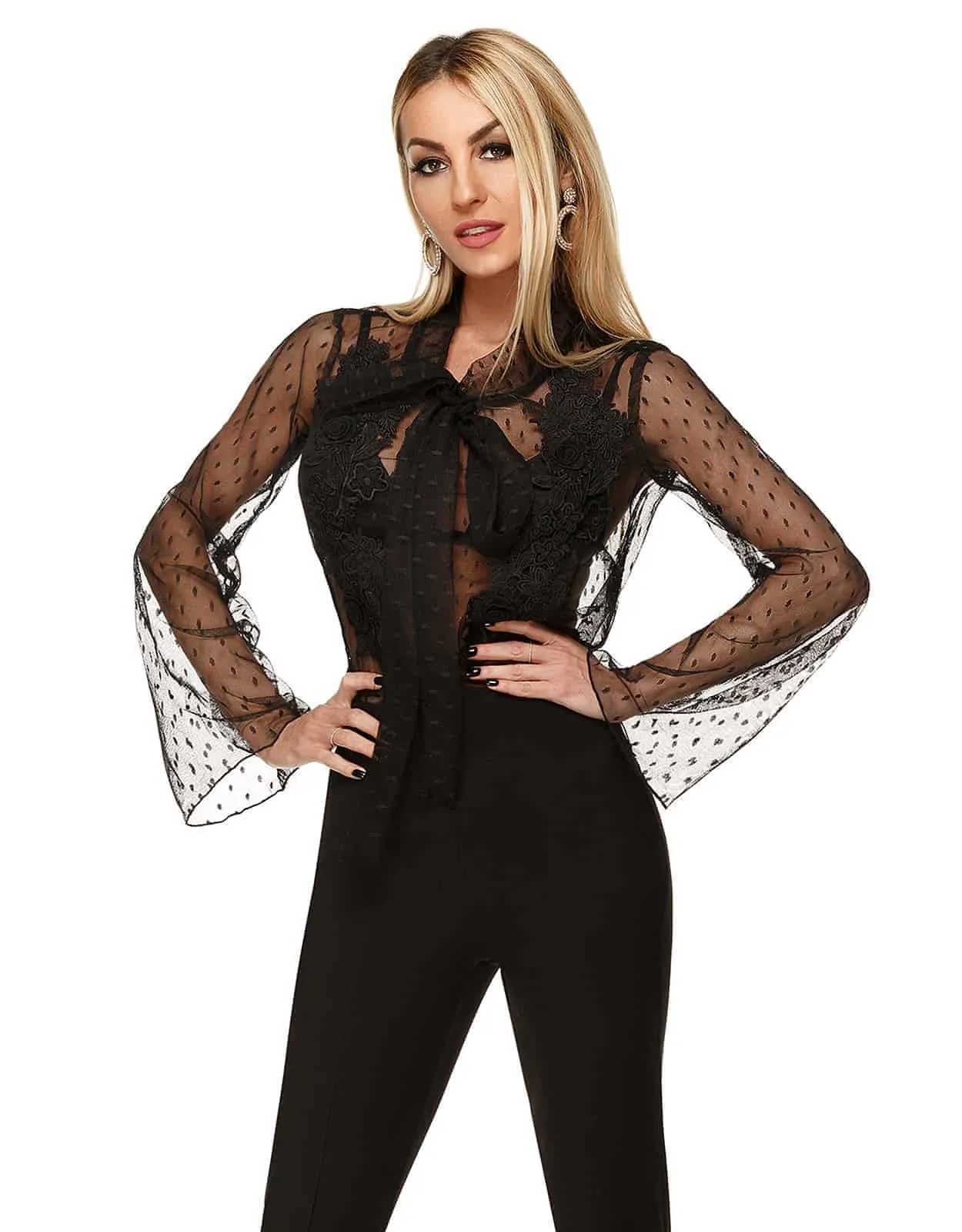 Blusa elegante in pizzo nero in fantasia a pois