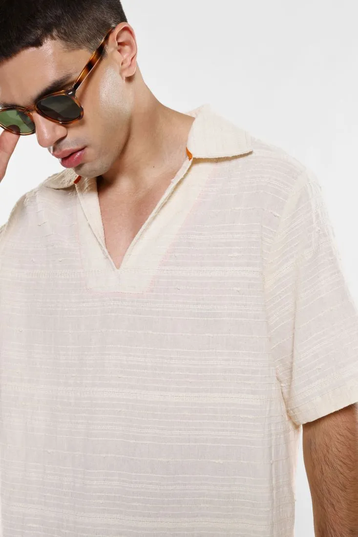 Camicia rigata in puro cotone con scollo a V