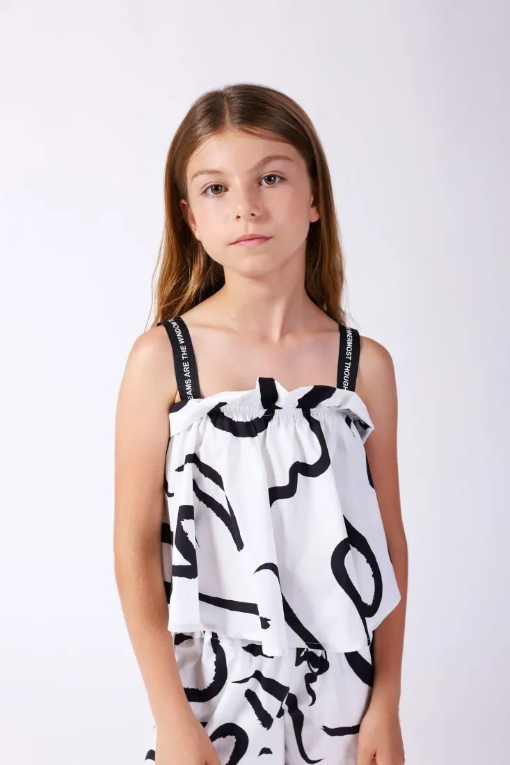 Camicia smanicata bambina in puro cotone fantasia astratta bicolor