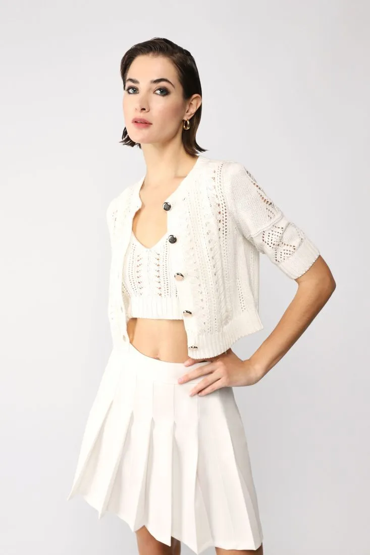 Cardigan cropped monocolour con lavorazione intrecciata