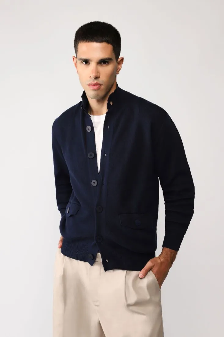 Cardigan monocolour con abbottonatura e tasche a filetto
