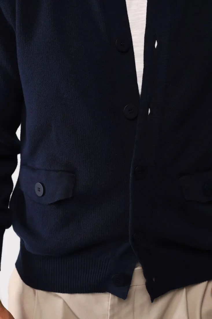 Cardigan monocolour con abbottonatura e tasche a filetto