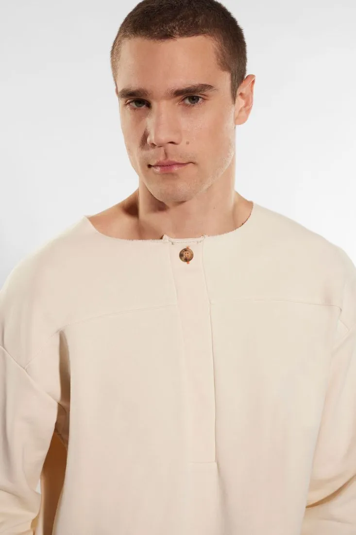 Felpa oversize monocolour con cuciture dettaglio e bottone