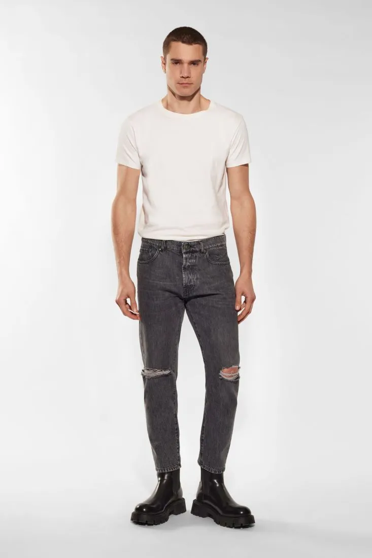 Jeans slim-fit in puro cotone con abrasioni