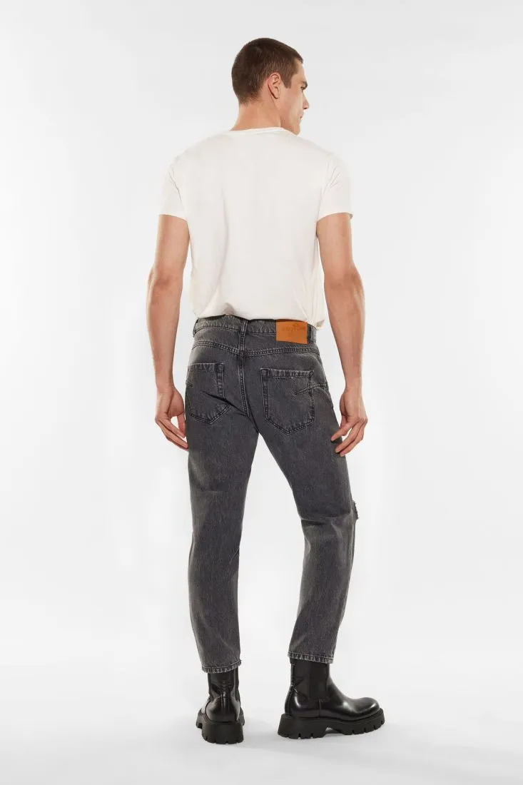 Jeans slim-fit in puro cotone con abrasioni
