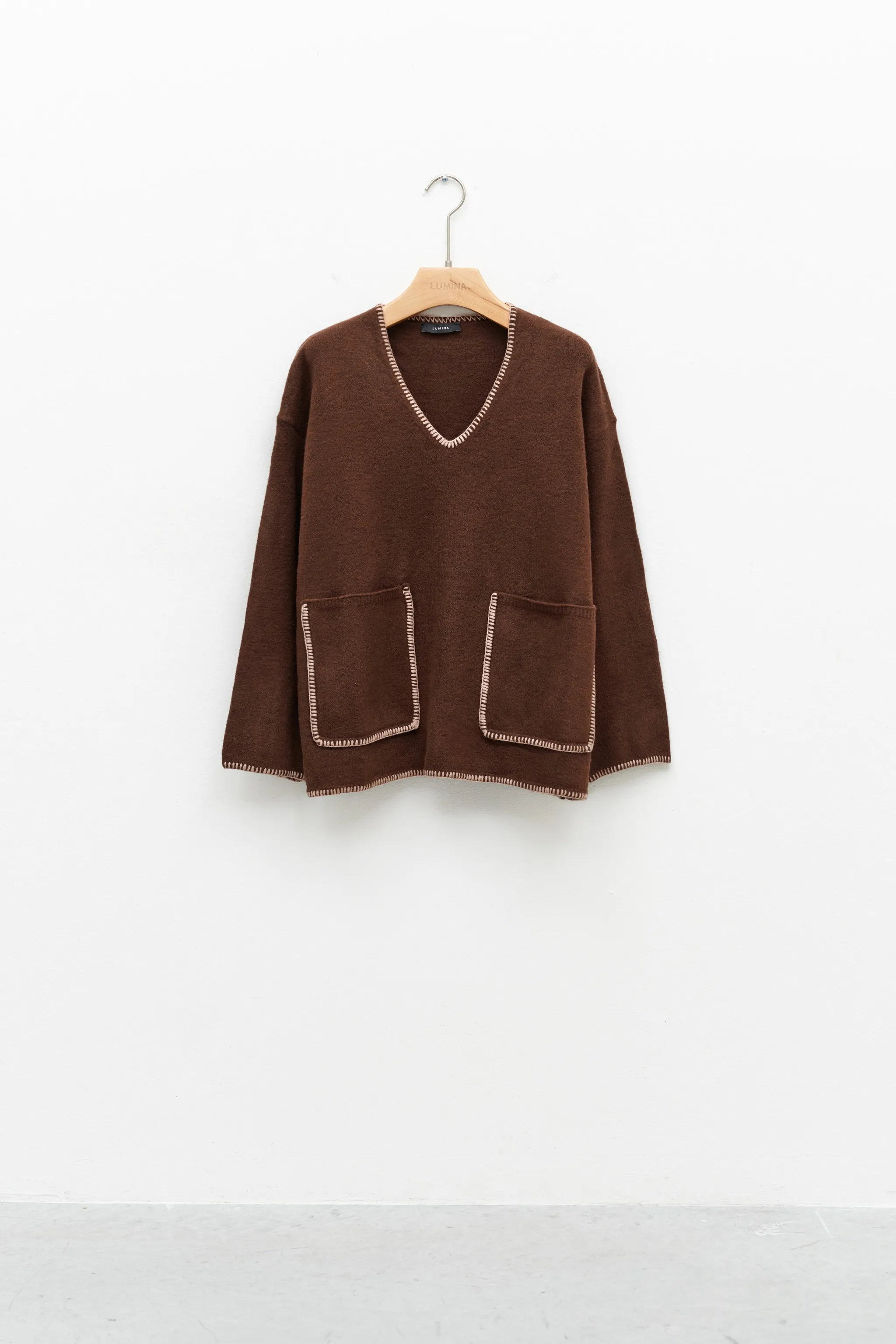 MAGLIONE CON TASCHE