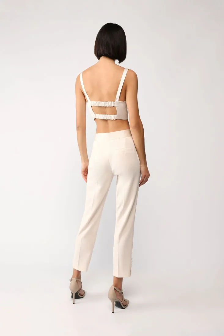 Pantaloni cropped straight monocolour con piega stirata