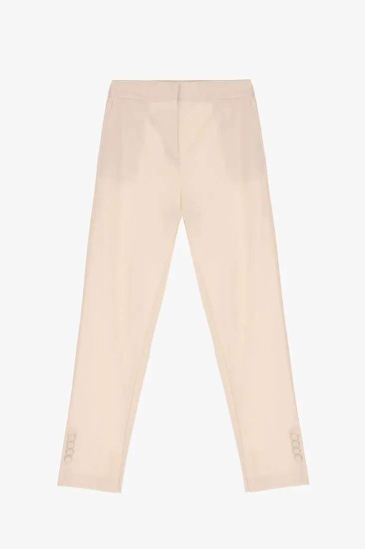Pantaloni cropped straight monocolour con piega stirata