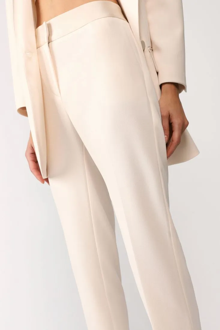 Pantaloni cropped straight monocolour con piega stirata