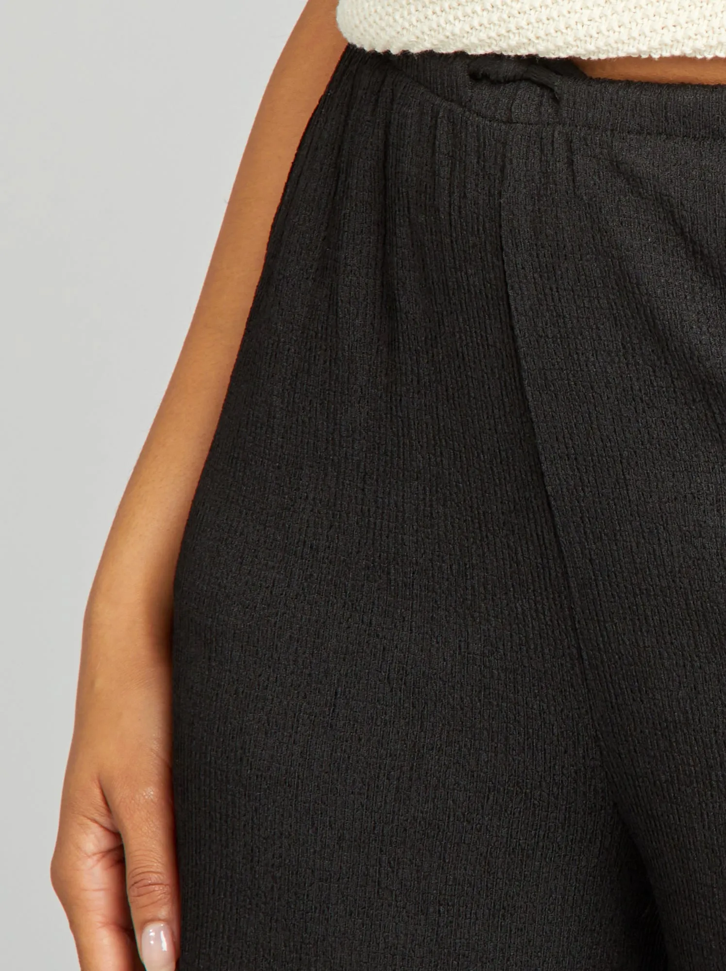 Pantaloni larghi in maglia goffrata - nero
