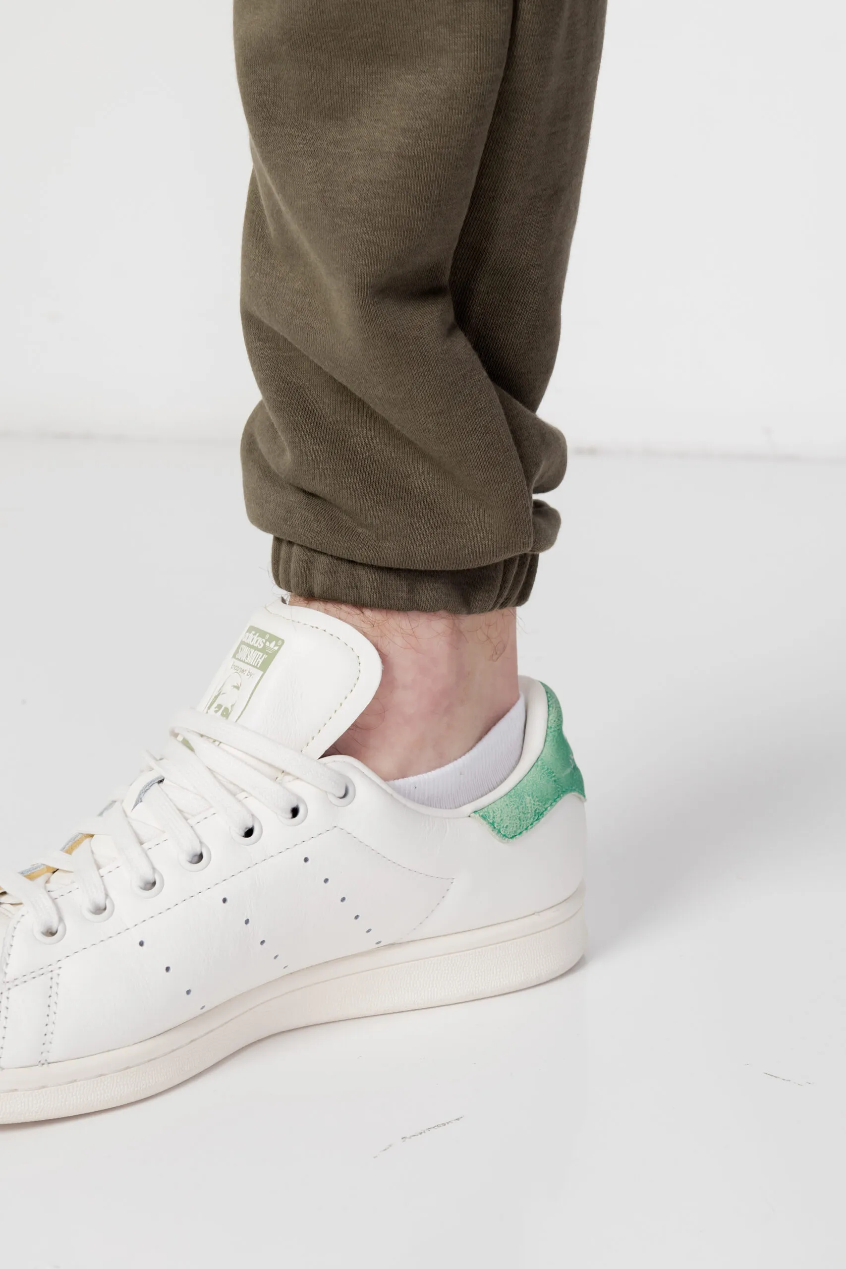 Pantaloni sportivi New Balance hoops essentials fundamental Verde Oliva