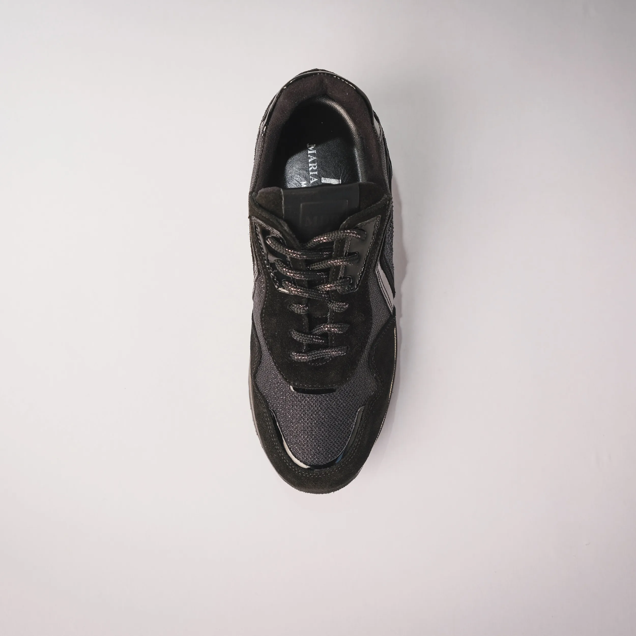 Sneakers in pelle con dettagli luminosi