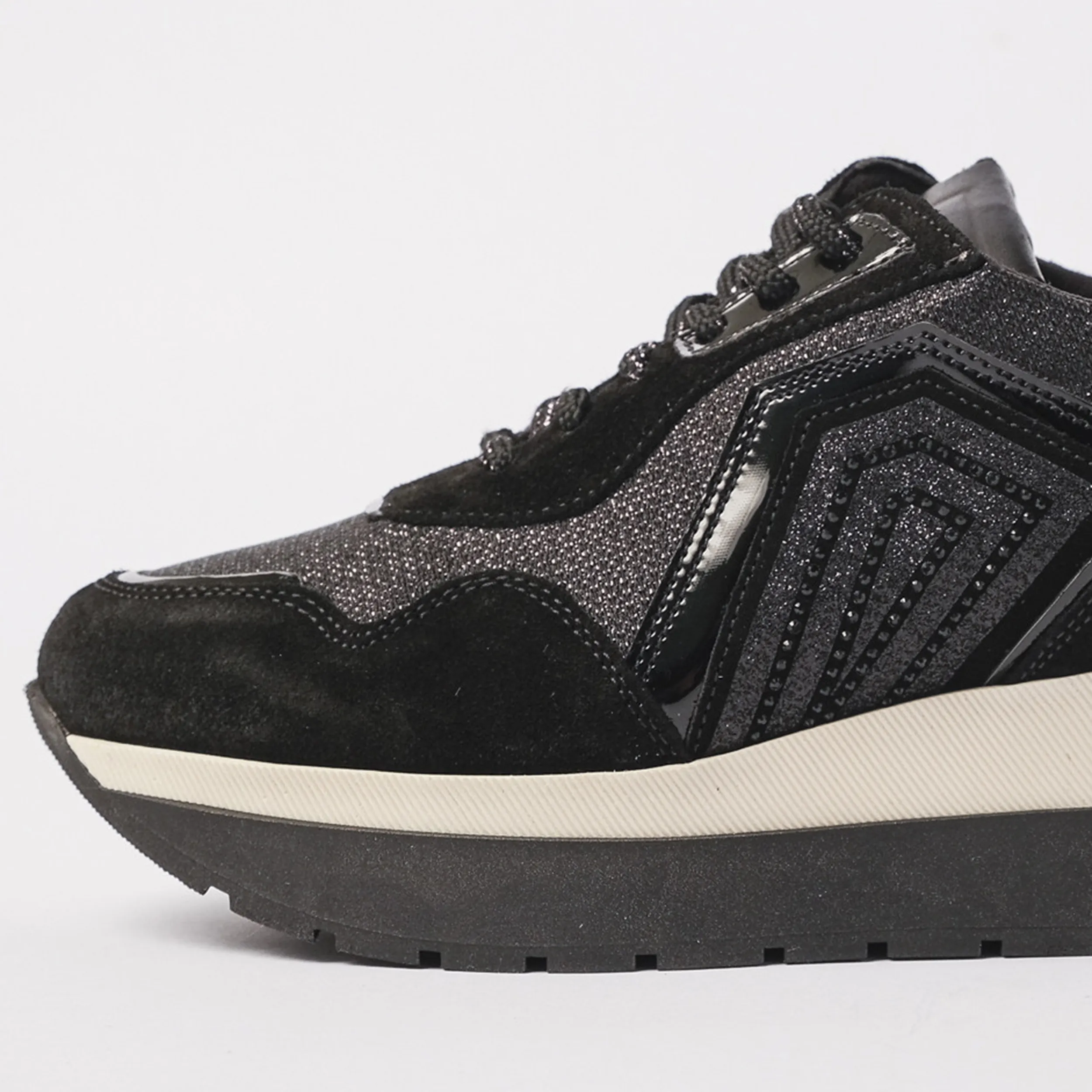 Sneakers in pelle con dettagli luminosi