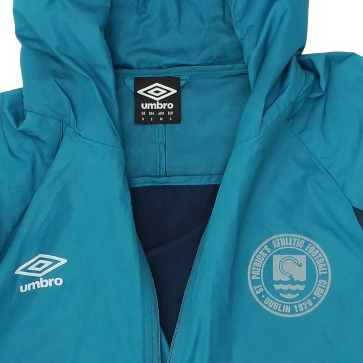St Patrick's Athletic FC Mens Blue Umbro Hooded Rain Jacket | Tracksuit Sports